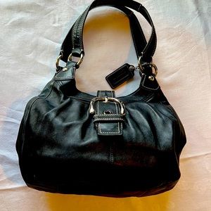 Authentic Coach black with powder blue lining